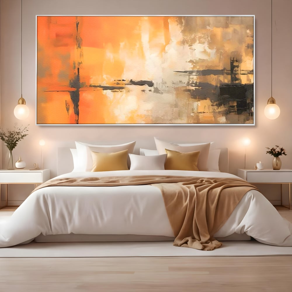 Tablou canvas cu pictura abstracta cu forme portocalii si negre, in rama de aluminiu argintiu, pe perete intr-un dormitor